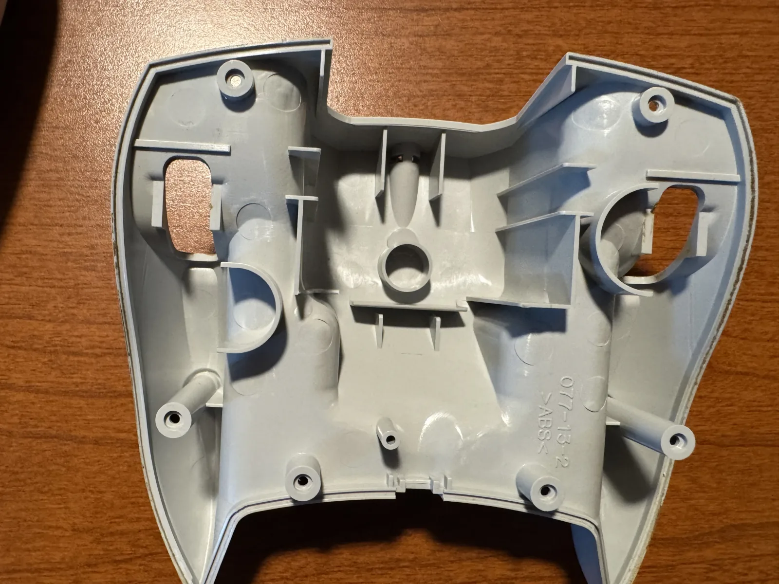 Inside of the controller back shell after the matching cable guard is removed