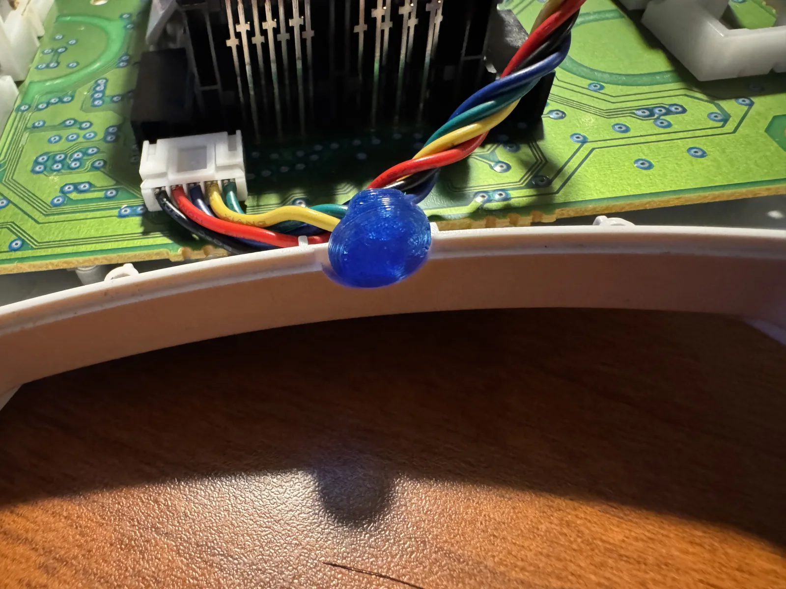 Blue 3D-printed cable cover fitted around the Pulsar cable